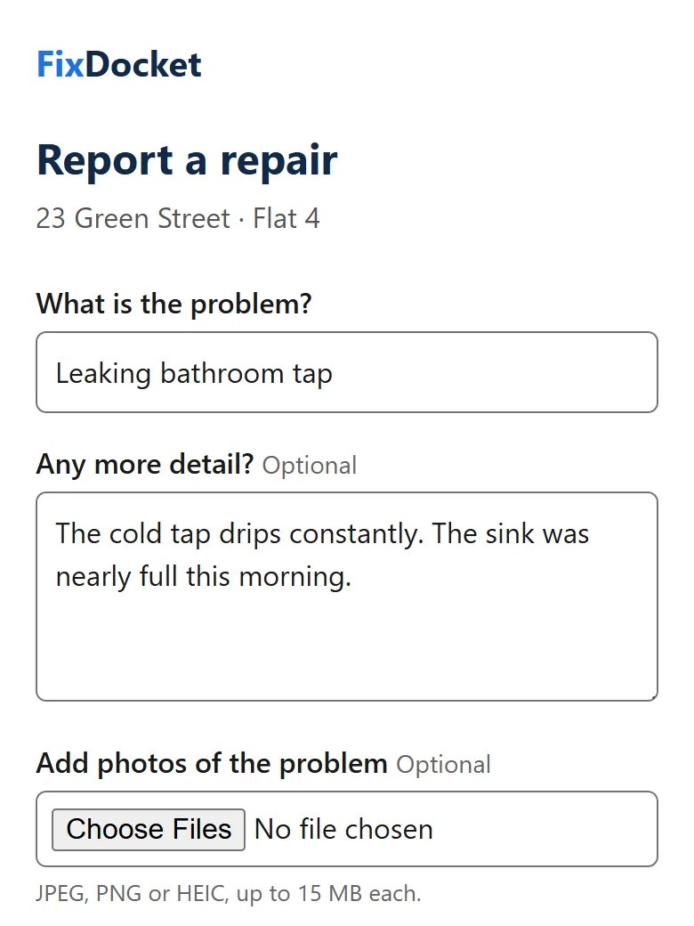 The report form on a phone, headed with the building and flat, with a leaking tap described.